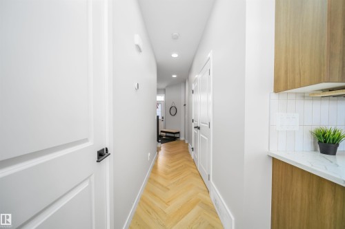 Hallway featuring recessed lighting and parquet floors - 15 Chambery Crescent, St. Albert, AB - Indoor Photo Showing Other Room