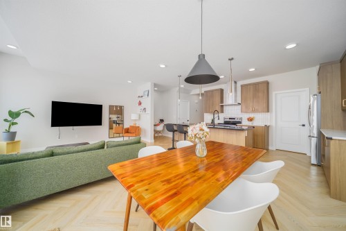 Dining room featuring parquet flooring and recessed lighting - 15 Chambery Crescent, St. Albert, AB - Indoor