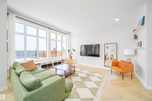 Living room featuring parquet flooring and recessed lighting - 15 Chambery Crescent, St. Albert, AB - Indoor Photo Showing Living Room