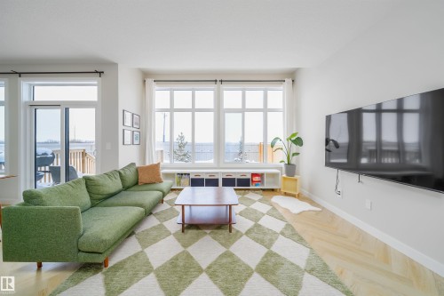 Living room featuring parquet floors and baseboards - 15 Chambery Crescent, St. Albert, AB - Indoor Photo Showing Living Room