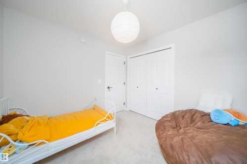 Carpeted bedroom featuring a closet - 15 Chambery Crescent, St. Albert, AB - Indoor Photo Showing Bedroom