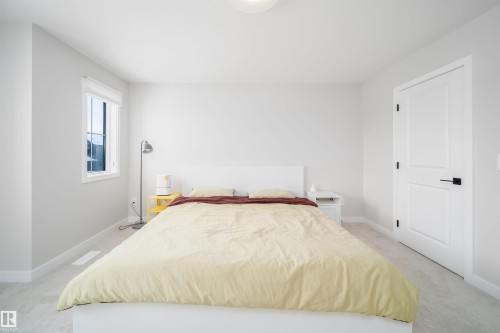 Bedroom featuring light carpet and baseboards - 15 Chambery Crescent, St. Albert, AB - Indoor Photo Showing Bedroom
