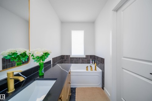 Bathroom with vanity and a bath - 15 Chambery Crescent, St. Albert, AB - Indoor Photo Showing Bathroom
