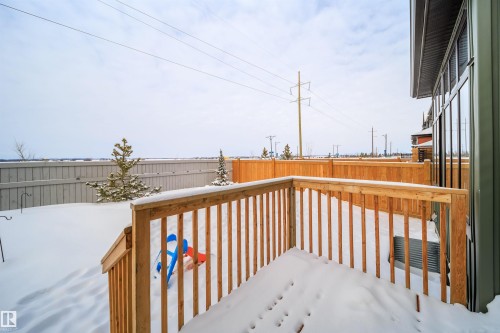 Snow covered deck featuring a fenced backyard - 15 Chambery Crescent, St. Albert, AB - Outdoor With Exterior