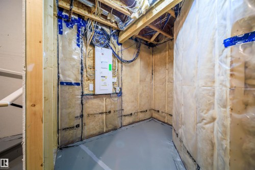 Unfinished basement with electric panel - 15 Chambery Crescent, St. Albert, AB - Indoor Photo Showing Basement