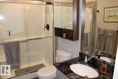 Full bath with vanity and a shower stall - 22 6519 46 Street, Wetaskiwin, AB - Indoor Photo Showing Bathroom