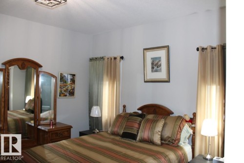 View of bedroom - 22 6519 46 Street, Wetaskiwin, AB - Indoor Photo Showing Bedroom