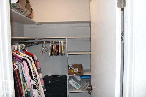 View of walk in closet - 22 6519 46 Street, Wetaskiwin, AB - Indoor With Storage