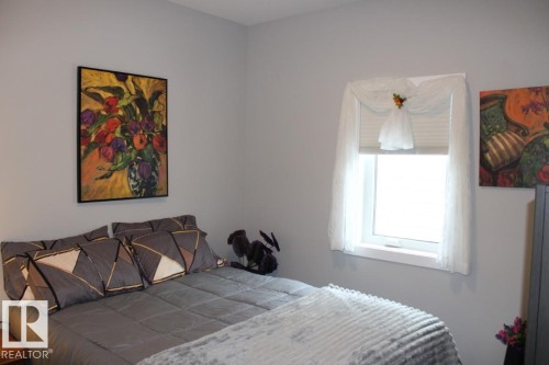 View of bedroom - 22 6519 46 Street, Wetaskiwin, AB - Indoor Photo Showing Bedroom