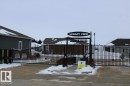 View of snow covered gate - 22 6519 46 Street, Wetaskiwin, AB  - Outdoor 