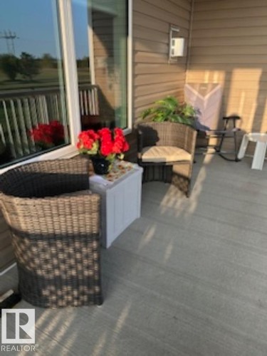 View of wooden deck - 22 6519 46 Street, Wetaskiwin, AB - Outdoor With Deck Patio Veranda With Exterior