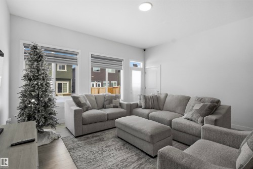 3888 Chrustawka Place, Edmonton, AB - Indoor Photo Showing Living Room