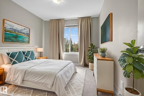 Carpeted bedroom with baseboards - 1717 Chapman Way, Edmonton, AB - Indoor Photo Showing Bedroom