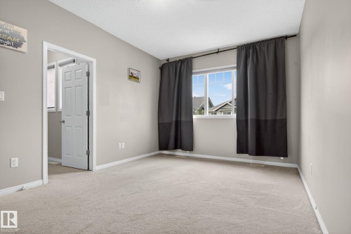 Unfurnished room with light carpet - 1717 Chapman Way, Edmonton, AB - Indoor