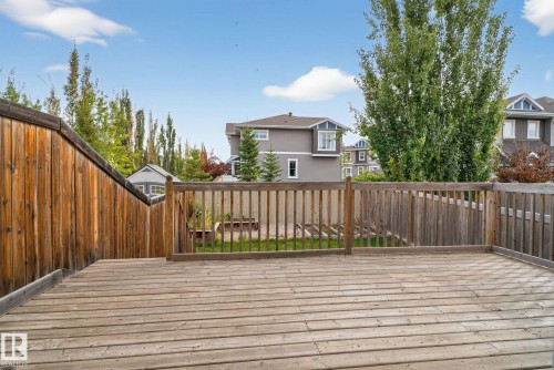 Wooden deck with a residential view - 1717 Chapman Way, Edmonton, AB - Outdoor With Exterior