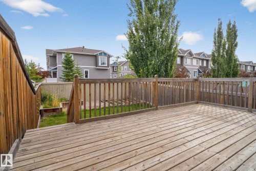Deck featuring a residential view and a fenced backyard - 1717 Chapman Way, Edmonton, AB - Outdoor With Exterior