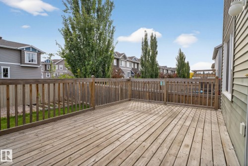 Wooden terrace with a residential view and a fenced backyard - 1717 Chapman Way, Edmonton, AB - Outdoor With Deck Patio Veranda With Exterior