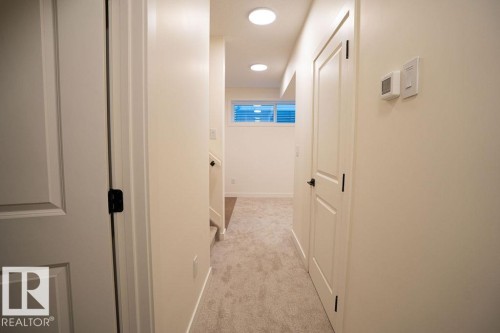 Hall featuring light carpet and recessed lighting - 11738 91 Street Nw, Edmonton, AB - Indoor Photo Showing Other Room
