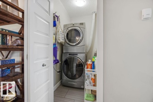 112 1238 Windermere Way, Edmonton, AB - Indoor Photo Showing Laundry Room