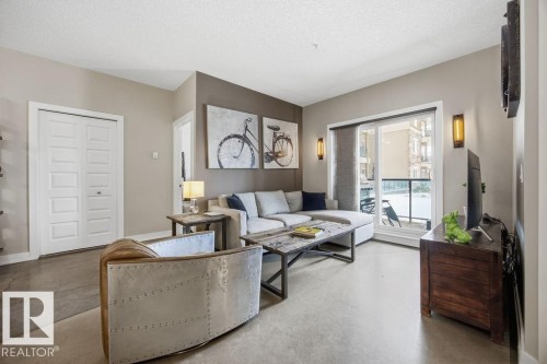 112 1238 Windermere Way, Edmonton, AB - Indoor Photo Showing Living Room