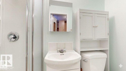 Bathroom featuring a stall shower and vanity - 4706 53 St, Leduc, AB - Indoor Photo Showing Bathroom