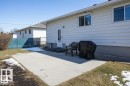Rear view of property with a patio area - 4706 53 St, Leduc, AB  - Outdoor With Exterior 