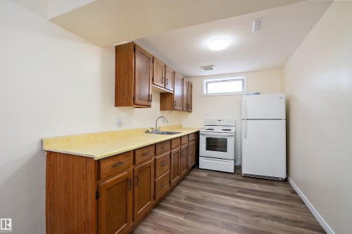 3207 107 Avenue, Edmonton, AB - Indoor Photo Showing Kitchen With Double Sink