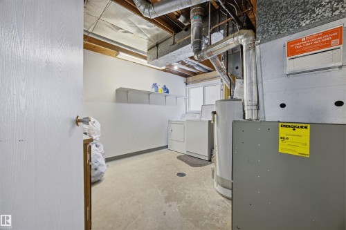 Common Laundry Area Shared By Both Levels. - 7918 121 Avenue, Edmonton, AB - Indoor Photo Showing Basement