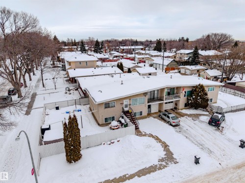 Snowy aerial view featuring a residential view - 7918 121 Avenue, Edmonton, AB - Outdoor With View