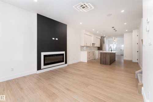 3103 Magpie Way, Edmonton, AB - Indoor Photo Showing Living Room With Fireplace