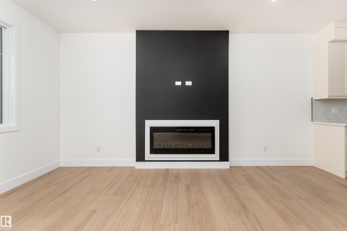 3103 Magpie Way, Edmonton, AB - Indoor Photo Showing Living Room With Fireplace
