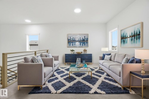 Living room featuring plenty of natural light, light carpet, and recessed lighting - 3294 Chernowski Way, Edmonton, AB - Indoor Photo Showing Living Room