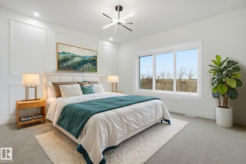 Bedroom featuring light carpet and recessed lighting - 3294 Chernowski Way, Edmonton, AB - Indoor Photo Showing Bedroom