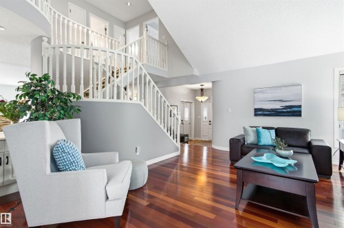 Living room with wood-type flooring and a high ceiling - 326 O'Connor Close, Edmonton, AB - Indoor