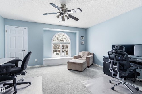 Office space featuring carpet floors, a textured ceiling, and ceiling fan - 326 O'Connor Close, Edmonton, AB - Indoor Photo Showing Office