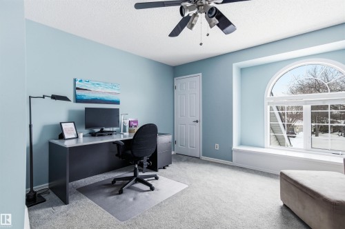 Office with light colored carpet, a textured ceiling, and ceiling fan - 326 O'Connor Close, Edmonton, AB - Indoor Photo Showing Office
