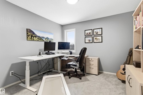 Office space with light colored carpet and baseboards - 326 O'Connor Close, Edmonton, AB - Indoor Photo Showing Office