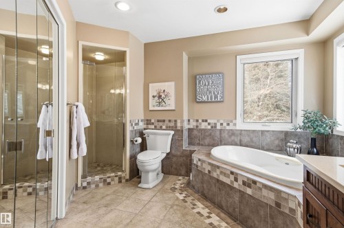 Bathroom with a shower stall, a garden tub, light tile patterned flooring, and vanity - 326 O'Connor Close, Edmonton, AB - Indoor Photo Showing Bathroom