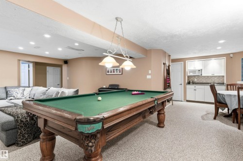Rec room with billiards, recessed lighting, light carpet, and a textured ceiling - 326 O'Connor Close, Edmonton, AB - Indoor Photo Showing Other Room