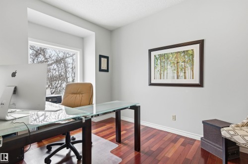 Office space featuring dark wood finished floors and a textured ceiling - 326 O'Connor Close, Edmonton, AB - Indoor Photo Showing Office