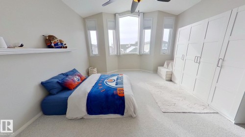 24 Pipestone Drive, Devon, AB - Indoor Photo Showing Bedroom
