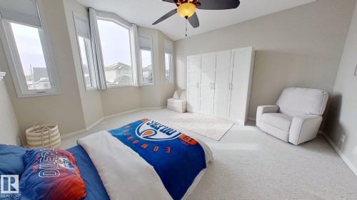 24 Pipestone Drive, Devon, AB - Indoor Photo Showing Bedroom
