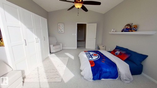 24 Pipestone Drive, Devon, AB - Indoor Photo Showing Bedroom
