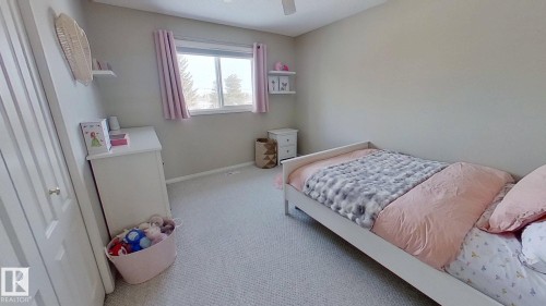 24 Pipestone Drive, Devon, AB - Indoor Photo Showing Bedroom