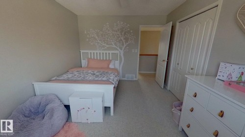 24 Pipestone Drive, Devon, AB - Indoor Photo Showing Bedroom