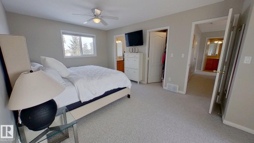 24 Pipestone Drive, Devon, AB - Indoor Photo Showing Bedroom