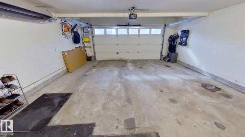 24 Pipestone Drive, Devon, AB - Indoor Photo Showing Garage