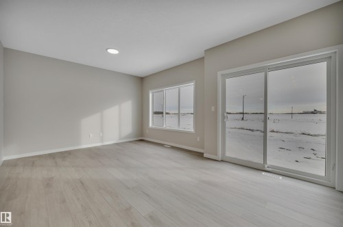 Spare room with light wood-style flooring and recessed lighting - 5657 Hawthorn Way, Edmonton, AB - Indoor Photo Showing Other Room