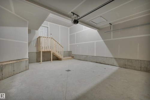 Garage featuring a garage door opener - 5657 Hawthorn Way, Edmonton, AB - Indoor