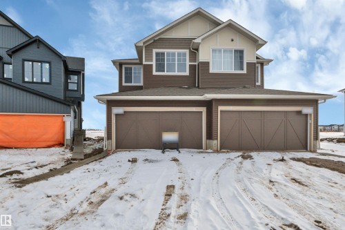 View of front of house with a garage and a shingled roof - 5657 Hawthorn Way, Edmonton, AB - Outdoor